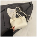 Chic beige lychee grain bucket bag with knot handle detail and adjustable strap - Rice White (No Pendant)