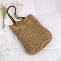 Handwoven straw tote bag in khaki with brown PU handles and wavy edge detail - Khaki