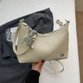 Beige lychee leather underarm bag with silver heart charm and adjustable strap - Off-White (With Pendant)
