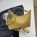Chic yellow crescent-shaped shoulder bag with litchi grain texture and heart charm - Yellow (With Pendant)