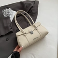 Elegante bolso de hombro blanco crema con grano de lichi y hebilla plateada - Blanco Roto