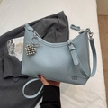 Light blue crescent shoulder bag in lychee leather with heart bead charm and strap - Blue (With Charm)