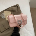 Pink patent leather shoulder bag featuring a sparkling crystal square buckle detail - Pink