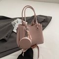 Pink lychee grain leather bucket bag with mini round coin pouch and slim shoulder strap - Pink With Pendant