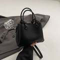 Borsa a secchiello minimalista in pelle nera con manico a nodo e tracolla sottile - Nero senza Ciondolo