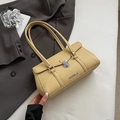 Elegante bolso de hombro en cuero amarillo con patrón de lichi y cierre giratorio plata - Amarillo