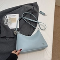 Minimalist light blue crescent shoulder bag with lychee texture and silver bead charm - Blue (Without Charm)