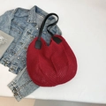 Chic red woven knit tote bag with black leather straps for spring 2025 casual style - Red