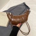 Coffee brown croissant bag with vertical quilted leather and silver metal brand logo - Brown