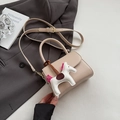 Chic beige crossbody handbag in smooth faux leather featuring a cute white pony charm - Khaki