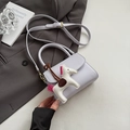 Light purple mini PU leather handbag with white pony charm and crossbody strap - Purple