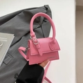 Mini hot pink lychee grain leather handbag with top handle and crossbody strap - Pink