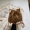 Handwoven khaki bucket bag in bohemian style with textured woven pattern and drawstring closure - Khaki