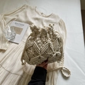 Chic beige macramé woven drawstring bucket bag with artistic geometric textures - Beige