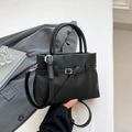 Chic black litchi grain leather handbag with silver buckle and detachable shoulder strap - Black