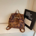 Water-dyed camo backpack with plaid patterns and embroidery in earth tones - Coffee