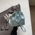 Minimalist light blue bucket bag in lychee leather featuring stylish drawstring closure - No Pendant / Blue