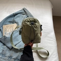 Grass green nylon drawstring crossbody bag with embroidered logo and sporty cord - Green