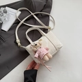 Mini cream pleated tote bag with bear charm on grey blazer for women - White With Pendant