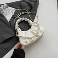 Creamy white pleated cloud bag with pearl handle and golden metal chain strap - White
