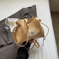 Creamy beige pleated shell bag in soft PU leather with adjustable chain shoulder strap - Yellow