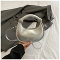 Silver crescent shoulder bag with metallic finish and metal handle details - Silver