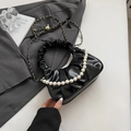 Black glossy half-moon cloud bag with pearl handle and golden chain shoulder strap - Black