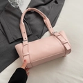 Chic sakura pink underarm bag with silver buckle straps and sleek cylindrical design - Pink
