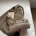 Retro cream white rectangular underarm bag with adjustable straps on white bedding - Off-white
