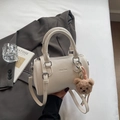 Minimalist creamy white leather Boston handbag with detachable strap and teddy bear charm - With Pendant / White