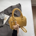 Yellow leather Boston cylinder bag with luxury pebble texture and cute bear charm - With Pendant / Yellow