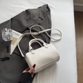 White minimalist lychee pattern cylinder handbag with silver hardware and adjustable strap - No Pendant / White