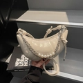 Creamy crescent bag in glossy patent leather with pearl and silver chain decoration - Off-white