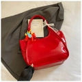Grande borsa tote rossa in pelle cerata lucida con fiocco e ciondolo pegaso - Rosso con Pendente