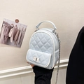 Mini light blue quilted backpack with silver metal chain and rhombus stitch pattern - Blue