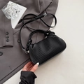 Elegant black pleated leather handbag with cylindrical handles and adjustable crossbody strap - Black