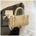 Elegant cream white lychee pattern crossbody bag with round top handles and silver hardware - White