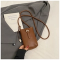 Vertical vintage brown lychee leather crossbody phone bag with heart pendant detail - Brown