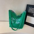 Bright green canvas tote bag with letter print and blue checkered lining detail - Green