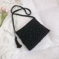 Borsa intrecciata nera fatta a mano in cotone con nappe e motivo geometrico - Nero