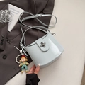 Chic light blue patent leather bucket bag with cute doll charm and silver lock - Blue with Charm