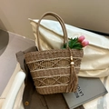 Handwoven straw tote bag with fringe charm and white wave pattern in natural tan finish - Khaki