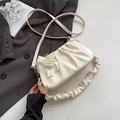 Cream pleated crossbody bag with pearl heart charm and two shoulder straps - White