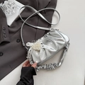 Silver metallic pleated handbag with lace bow and pearl heart charm detail - Silver