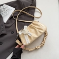 Cream pleated crossbody bag featuring a pearl heart and lace bow detail for women - Yellow