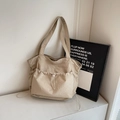 Minimalist beige large capacity tote bag with front drawstring pocket for daily use - Off-white