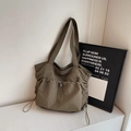 Large army green tote bag with drawstring pockets and adjustable wide shoulder strap - Green