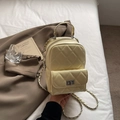 Chic quilted pale yellow mini backpack with chain strap and metallic lock closure - Yellow