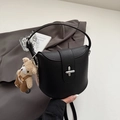 Black lychee leather shoulder bag with silver clasp and a cute plush bear charm - Black With Pendant