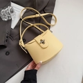 Light yellow lychee textured underarm bag with silver twist lock and adjustable strap - Yellow Without Pendant